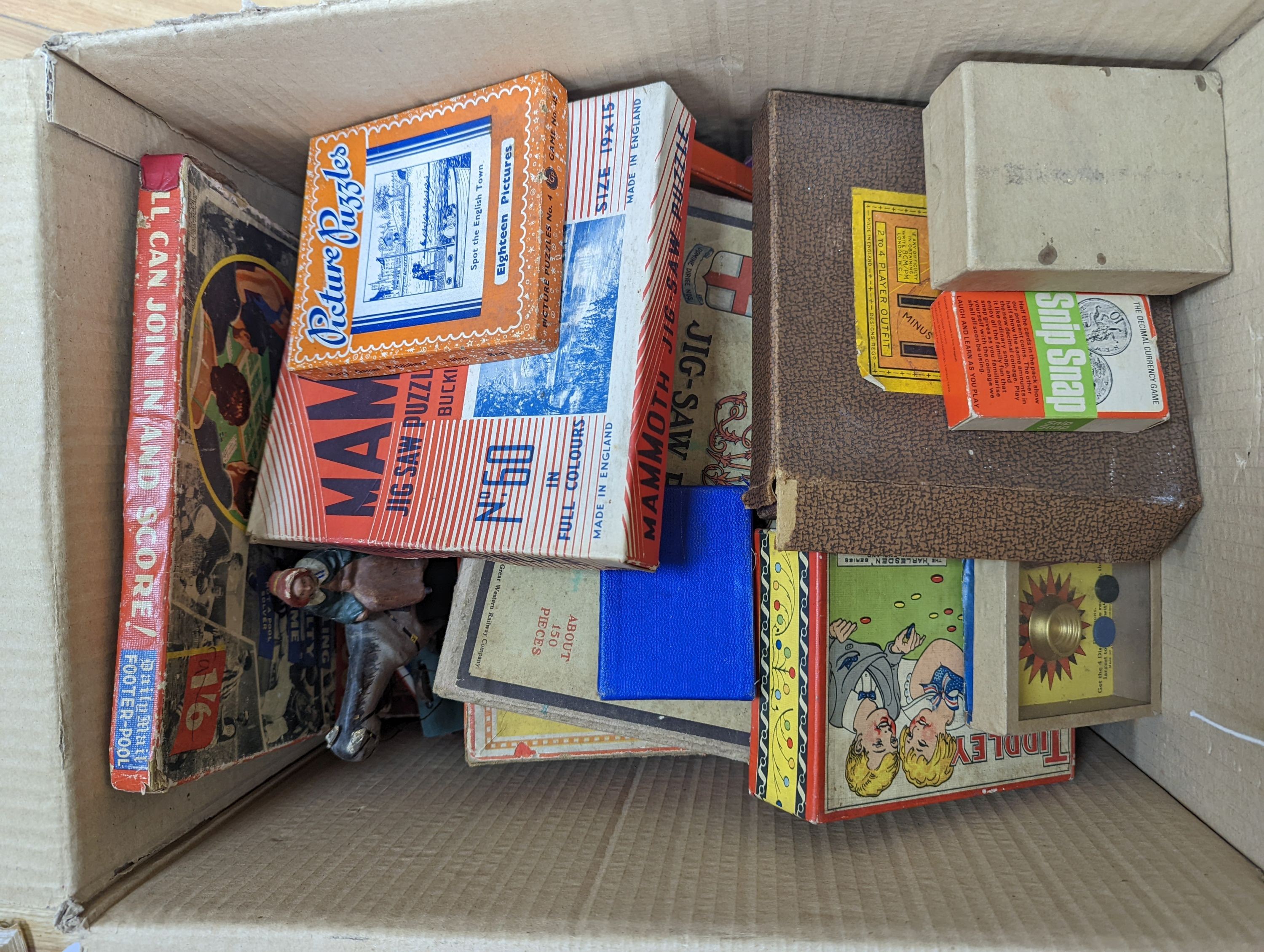 Two boxes containing games and puzzles, late 19th to mid 20th century